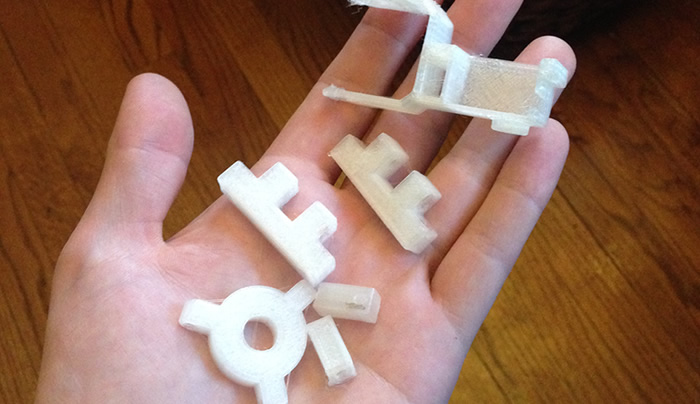 3d printed robot parts in hand